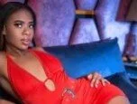 Jerkmate Ebony Cam Girl in Red Dress